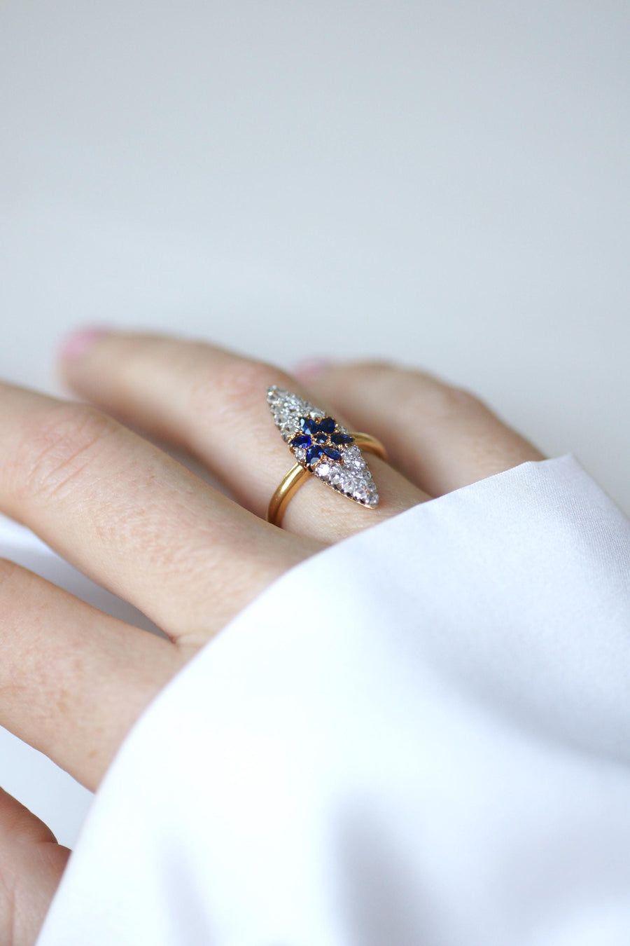 Antique Marquise Sapphire Star Ring Surrounded by Diamonds on Yellow Gold and Platinum