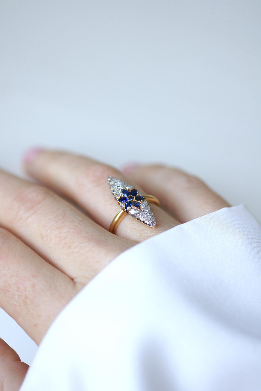 Antique Marquise Sapphire Star Ring Surrounded by Diamonds on Yellow Gold and Platinum