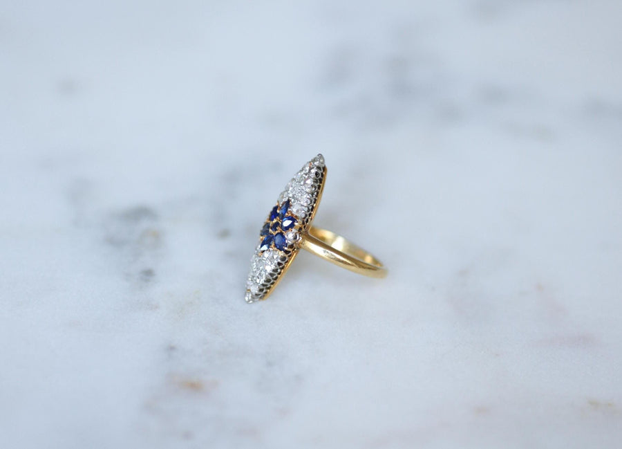 Antique Marquise Sapphire Star Ring Surrounded by Diamonds on Yellow Gold and Platinum