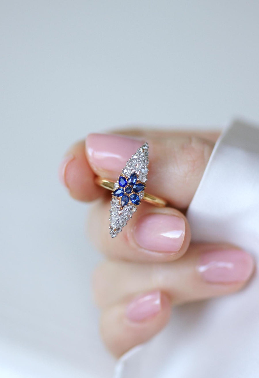 Antique Marquise Sapphire Star Ring Surrounded by Diamonds on Yellow Gold and Platinum