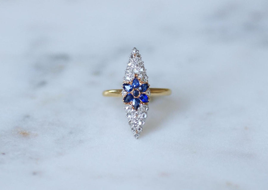 Antique Marquise Sapphire Star Ring Surrounded by Diamonds on Yellow Gold and Platinum
