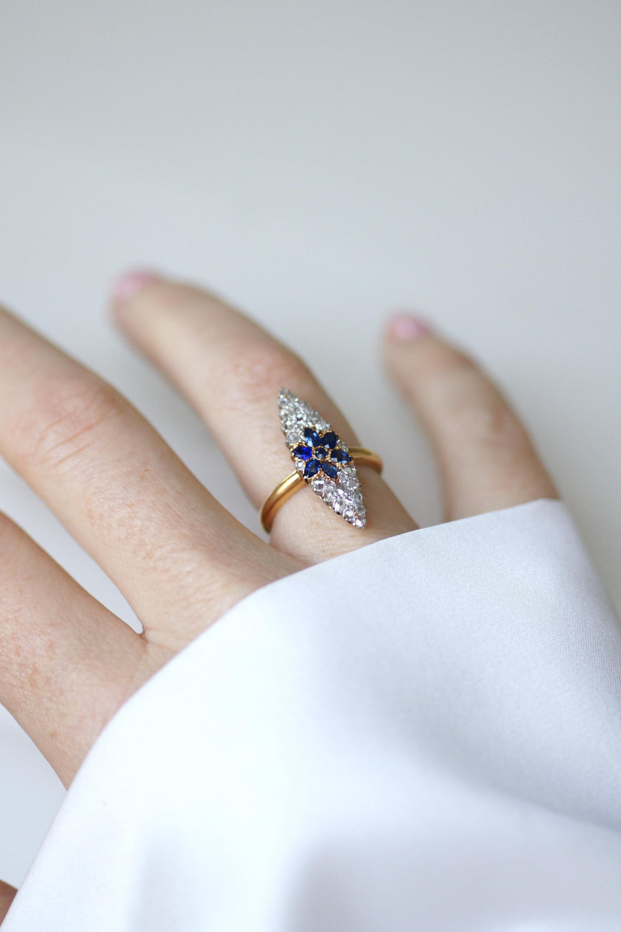 Antique Marquise Sapphire Star Ring Surrounded by Diamonds on Yellow Gold and Platinum