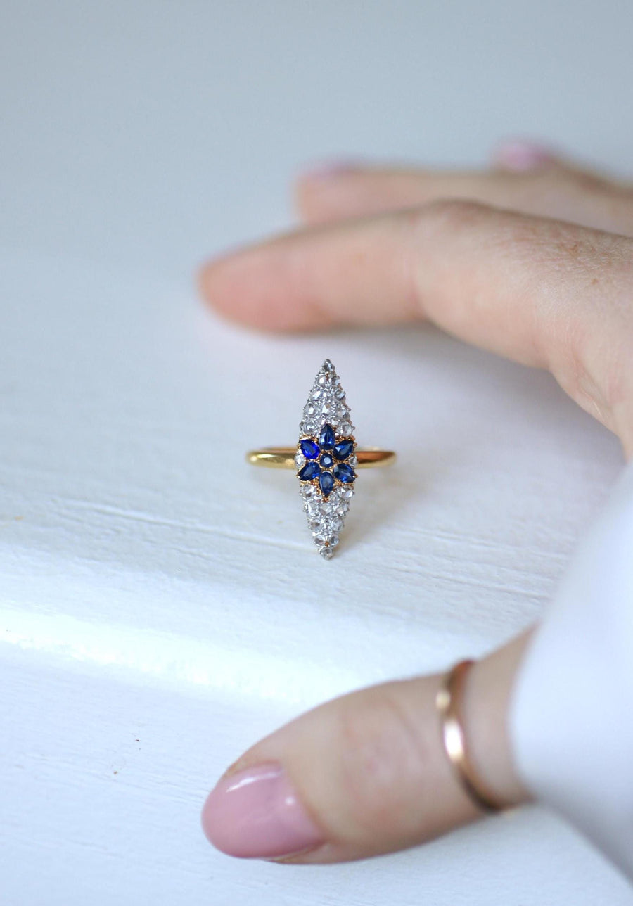 Antique Marquise Sapphire Star Ring Surrounded by Diamonds on Yellow Gold and Platinum