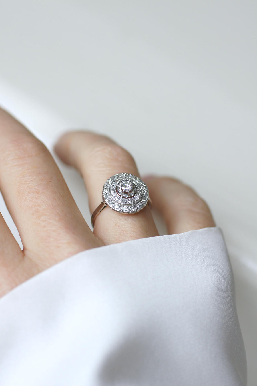 Art Deco Double Entourage Diamond Target Ring 0.60 Ct on White Gold and Platinum