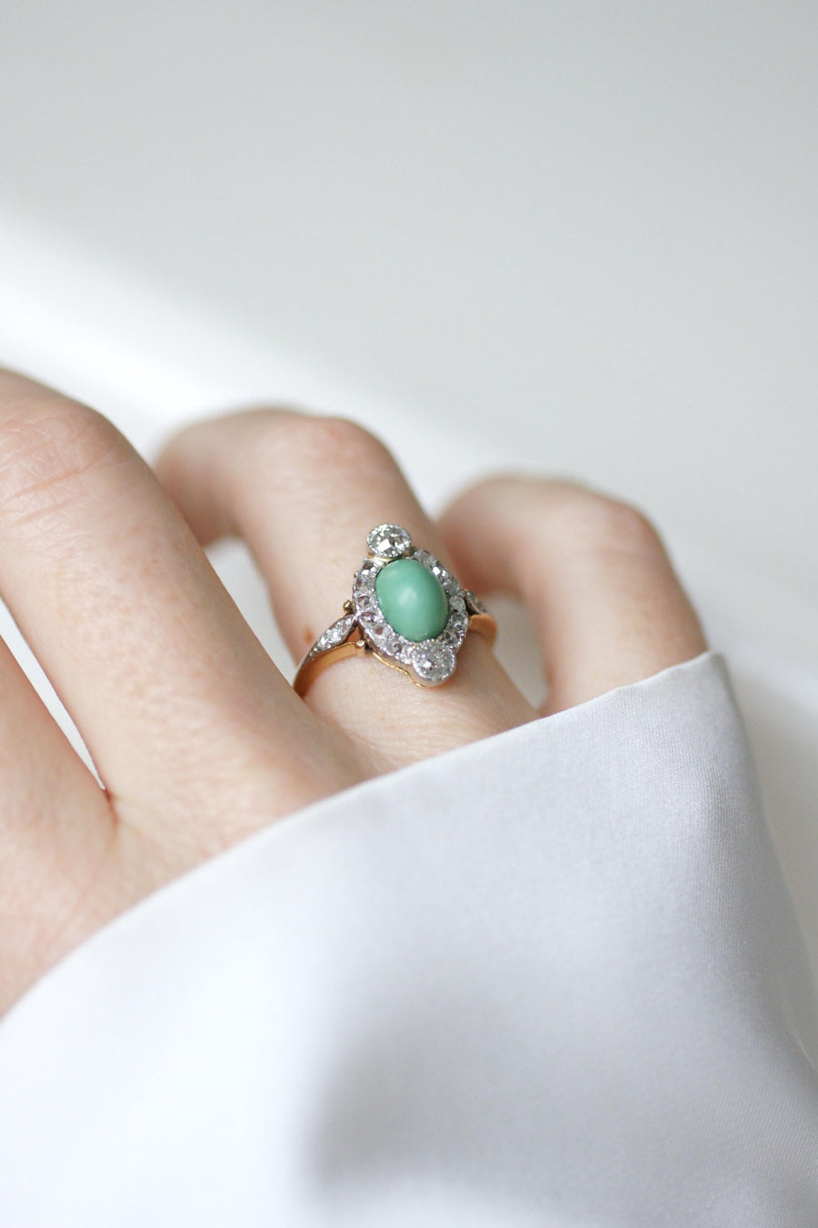 Belle Epoque Turquoise Ring Surrounded by 0.75 Ct Diamonds on Yellow Gold and Platinum