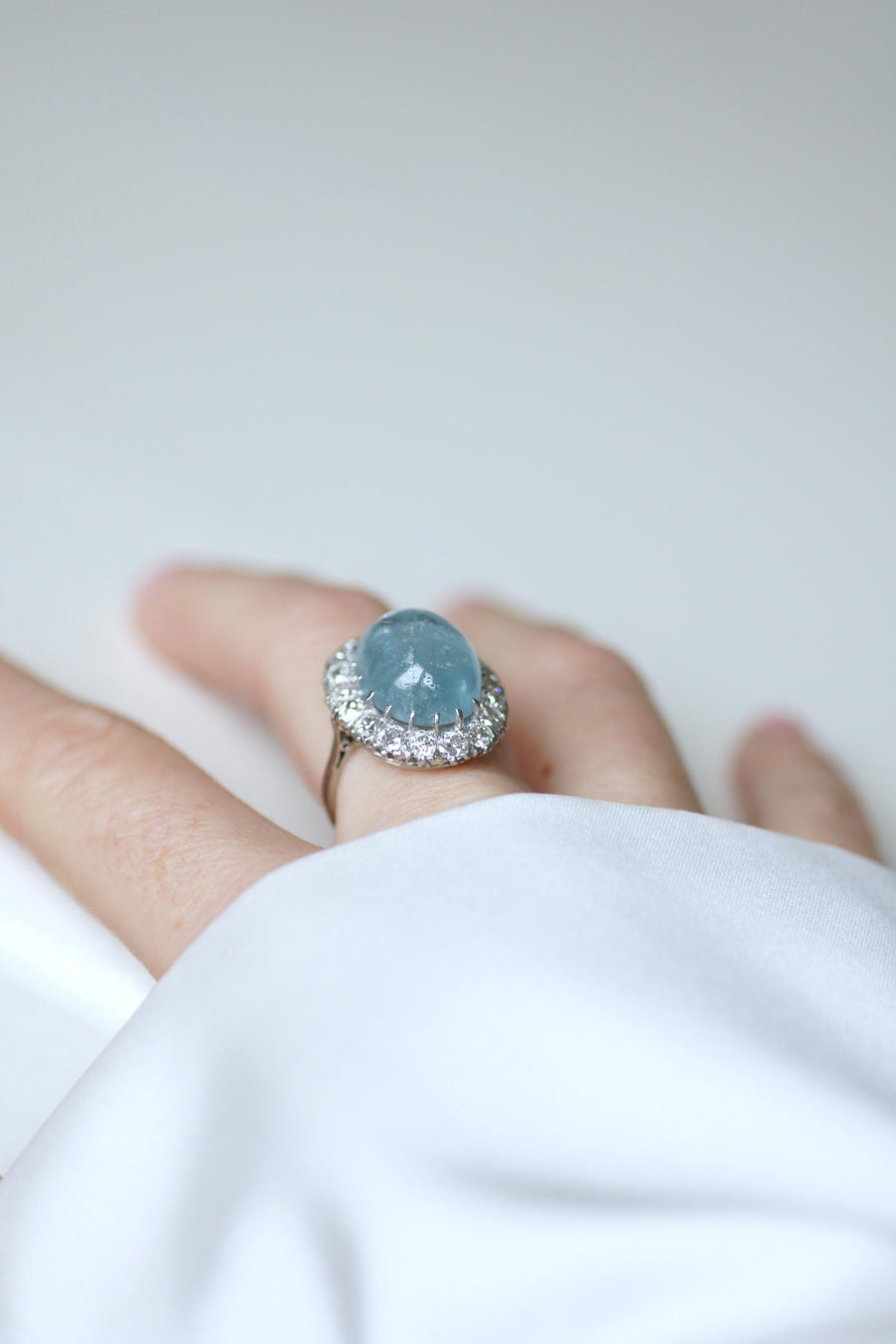 Cabochon Aquamarine and Diamonds on Gold and Platinum Art Deco Daisy Ring