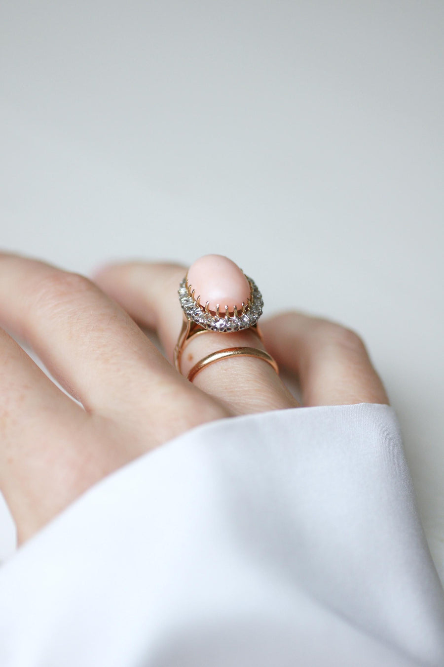 Ring Marguerite Belle Epoque Coral Peau d'Ange Surrounded by Diamonds