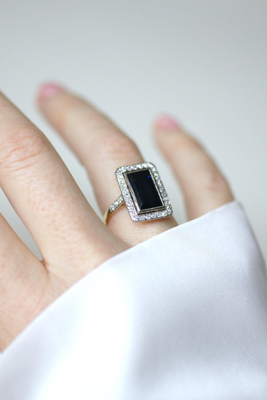 Art Deco Rectangle Ring Sapphire 4.40 Cts surrounded by Diamonds on Yellow Gold and Platinum