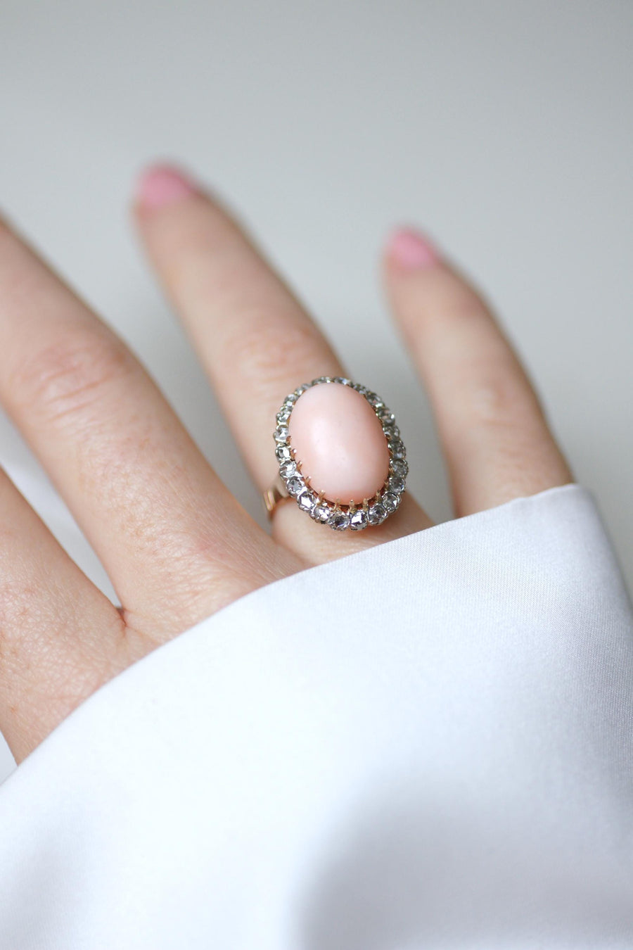 Ring Marguerite Belle Epoque Coral Peau d'Ange Surrounded by Diamonds