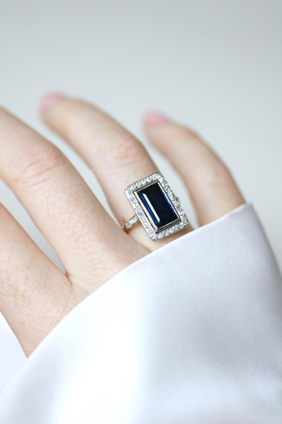 Art Deco Rectangle Ring Sapphire 4.40 Cts surrounded by Diamonds on Yellow Gold and Platinum
