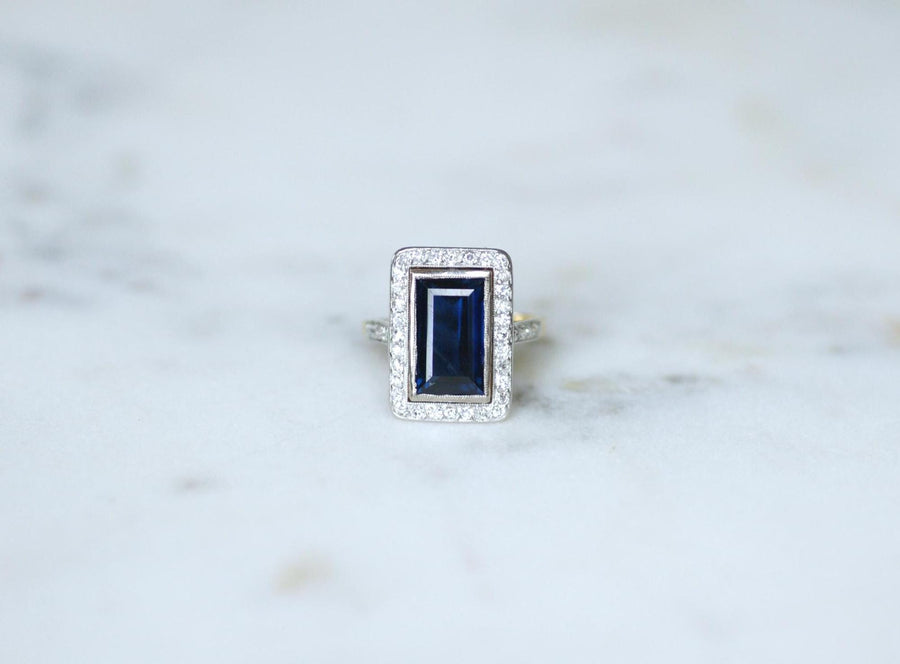 Art Deco Rectangle Ring Sapphire 4.40 Cts surrounded by Diamonds on Yellow Gold and Platinum