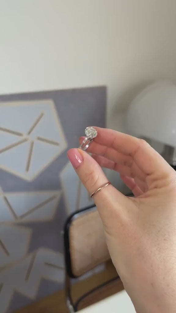 3.18 Carat Diamond Solitaire Ring with Baguette Setting in White Gold