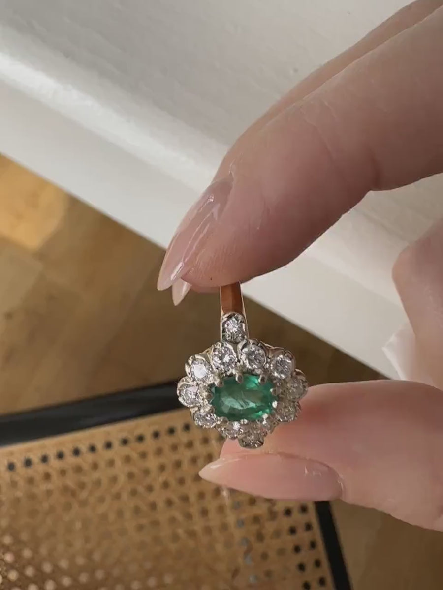 Emerald and diamond daisy ring on gold