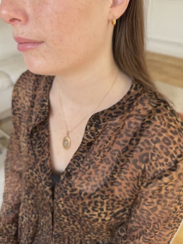 Belle Epoque oval opening medallion with navette-cut rose diamond on rose gold