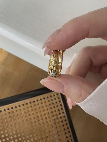 Yellow gold and diamond antique flower band ring