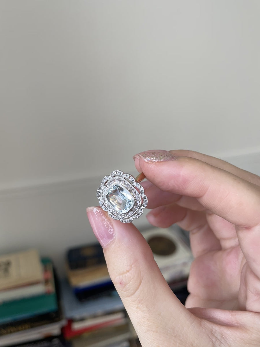 Double aquamarine ring with diamonds