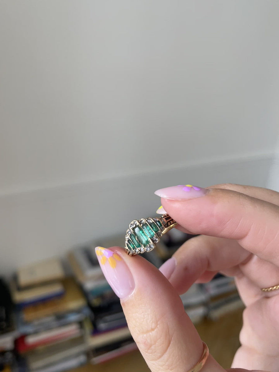 Emerald and diamond band ring
