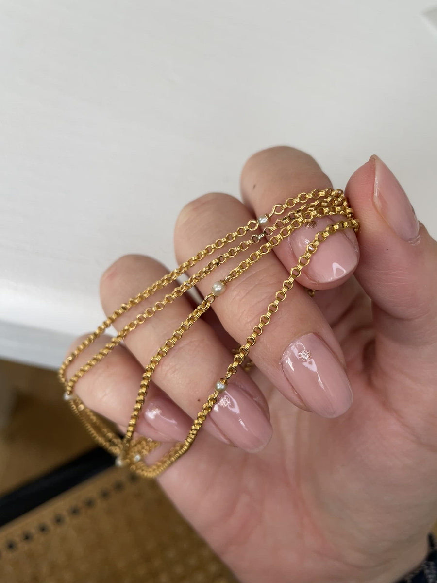 Long necklace with gold jaseron mesh and fine pearls