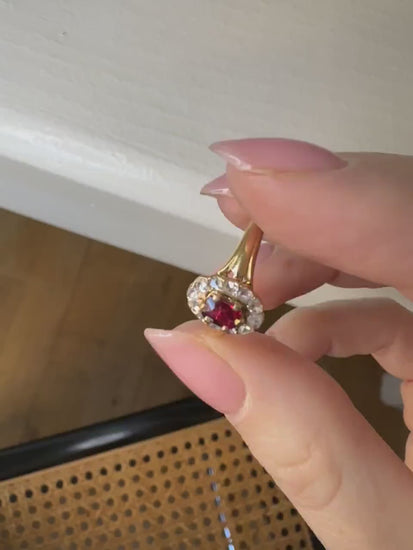 Antique ruby engagement ring with diamonds on pink gold