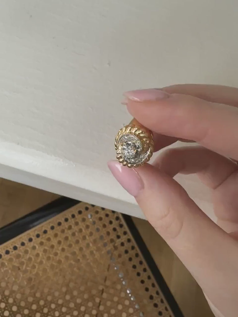 Vintage tourbillon ring in rose gold, platinum, and diamonds