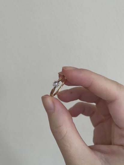 Diamond solitaire on pink gold and silver