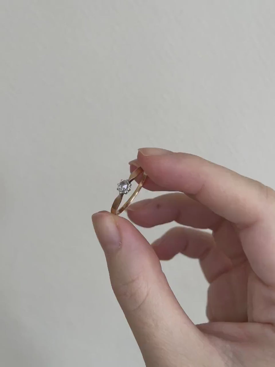 Diamond solitaire on pink gold and silver
