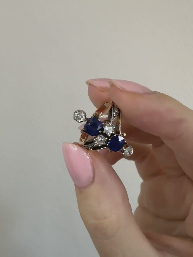 Antique marquise ring with sapphires and diamonds on pink gold and silver