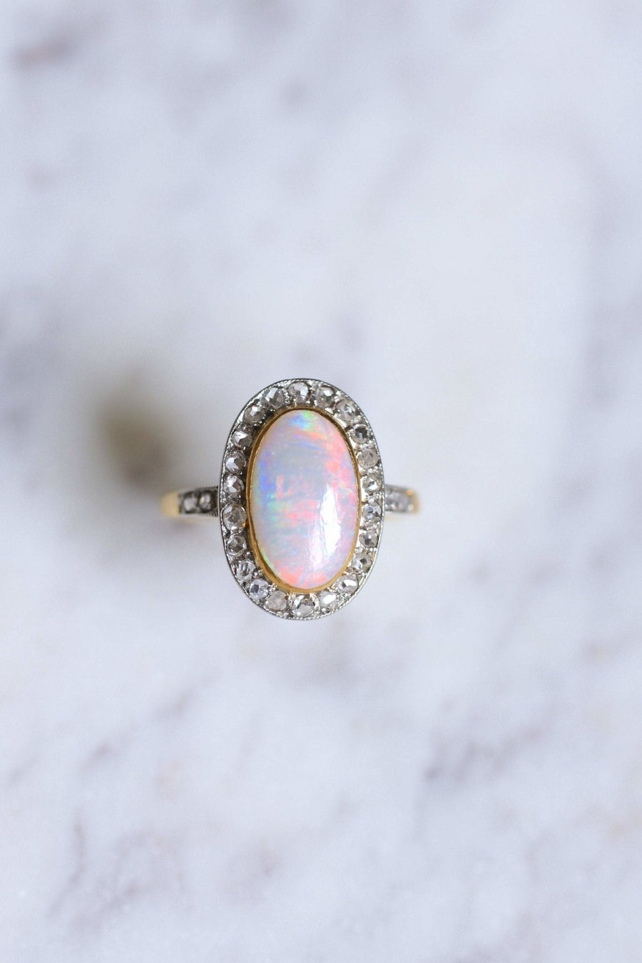 Antique opal ring surrounded by diamonds on gold and platinum - Galerie Pénélope
