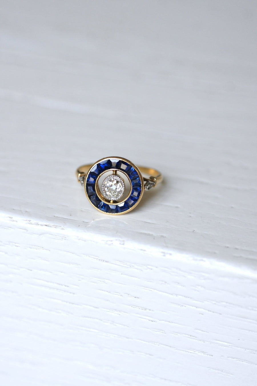 Art Deco diamond ring surrounded by synthetic sapphires - Penelope Gallery