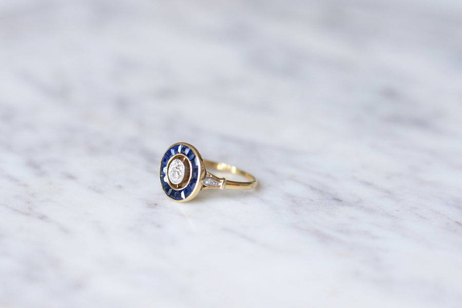 Art Deco diamond ring surrounded by synthetic sapphires - Penelope Gallery