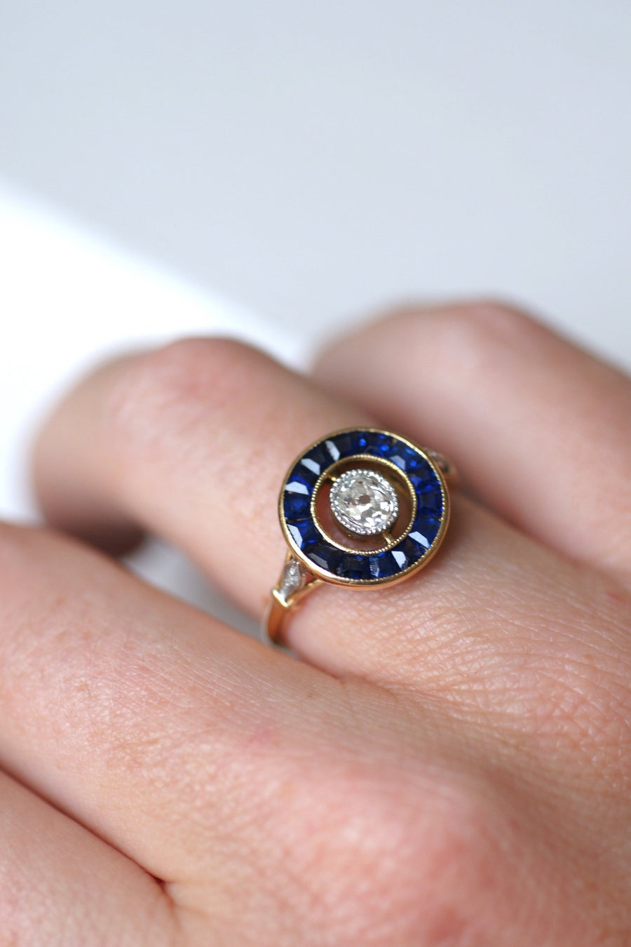 Art Deco diamond ring surrounded by synthetic sapphires - Penelope Gallery
