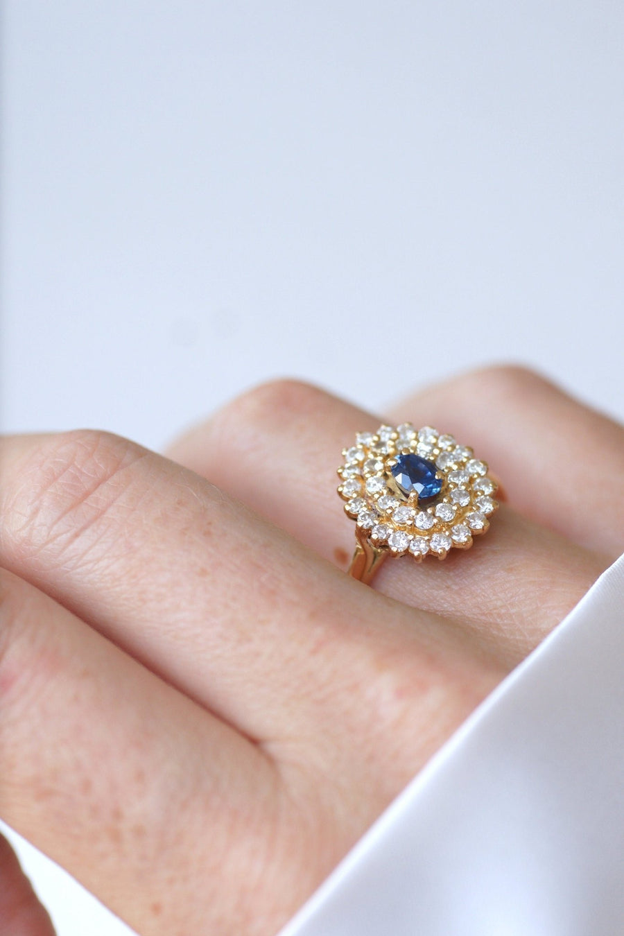Sapphire drop ring surrounded by diamonds - Penelope Gallery