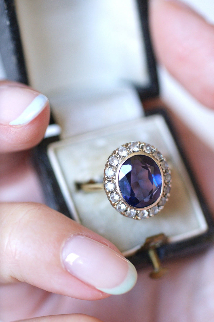 Synthetic sapphire daisy ring surrounded by white sapphires - Penelope Gallery