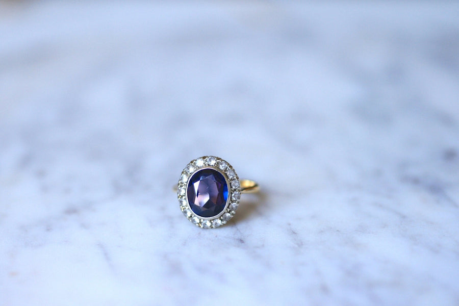 Synthetic sapphire daisy ring surrounded by white sapphires - Penelope Gallery