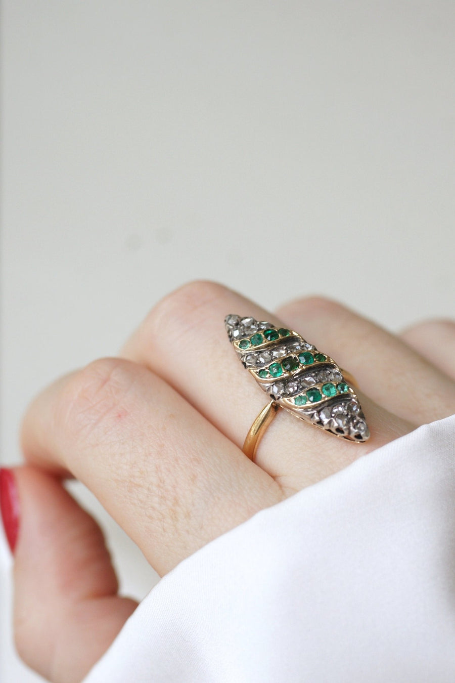 Antique marquise ring with emeralds and diamonds on gold and silver - Penelope Gallery