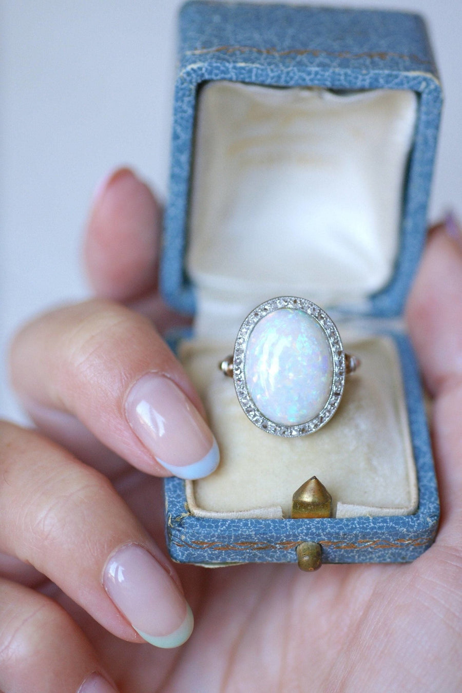 Opal ring surrounded by diamonds - Penelope Gallery