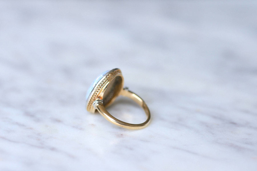 Opal ring surrounded by diamonds - Penelope Gallery