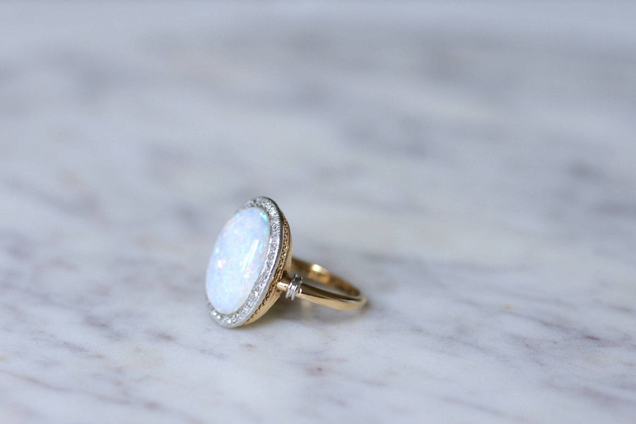 Opal ring surrounded by diamonds - Penelope Gallery