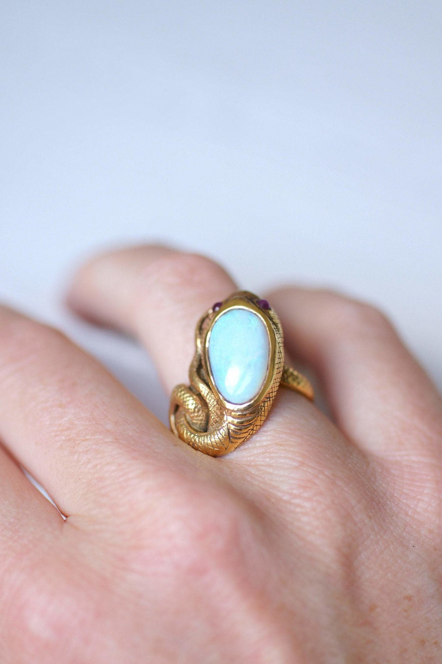 Vintage yellow gold, opal, and ruby snake ring - Penelope Gallery