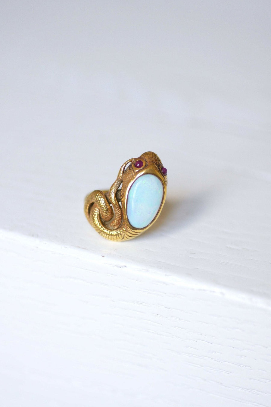 Vintage yellow gold, opal, and ruby snake ring - Penelope Gallery