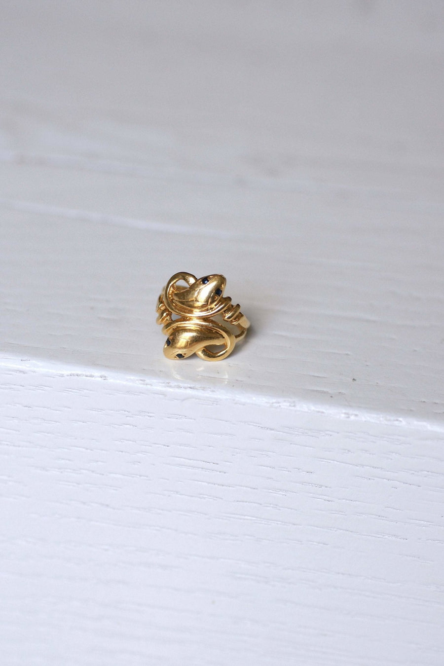 Gold and sapphire coiled snakes ring - Penelope Gallery