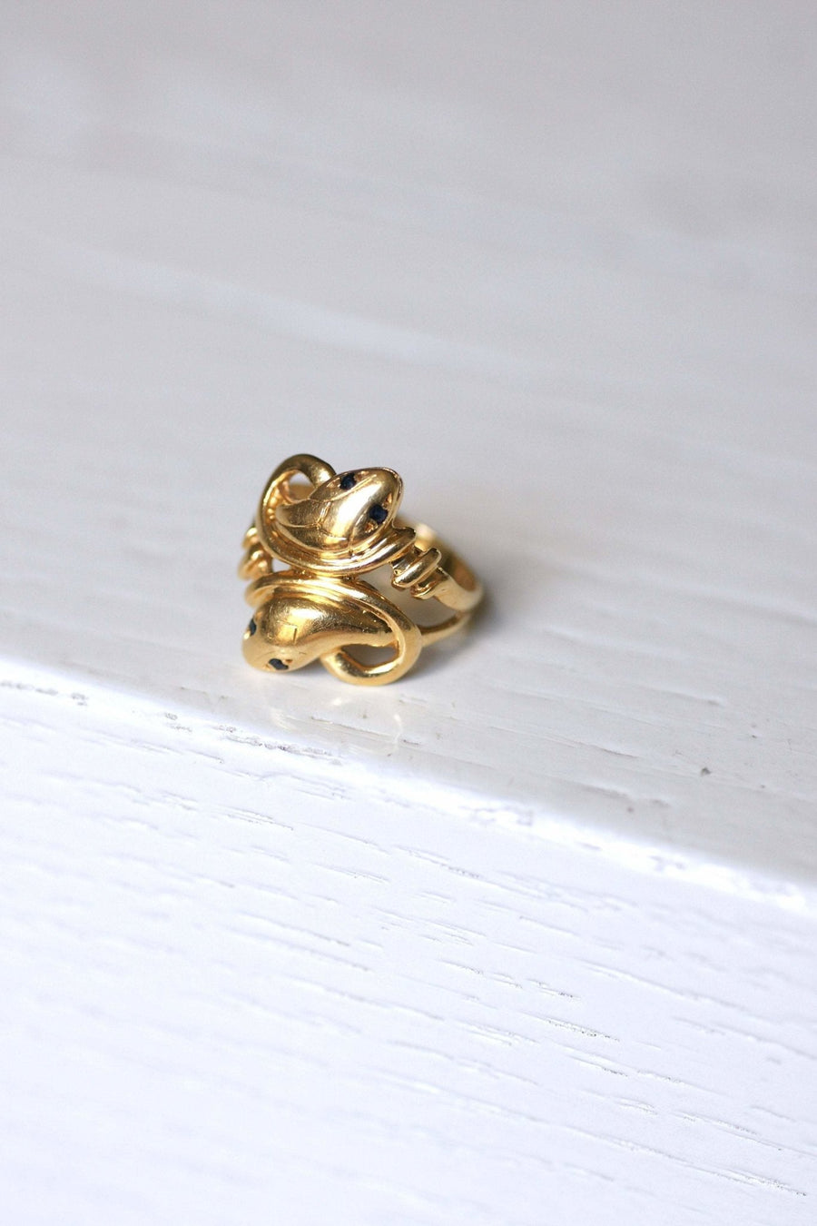 Gold and sapphire coiled snakes ring - Penelope Gallery
