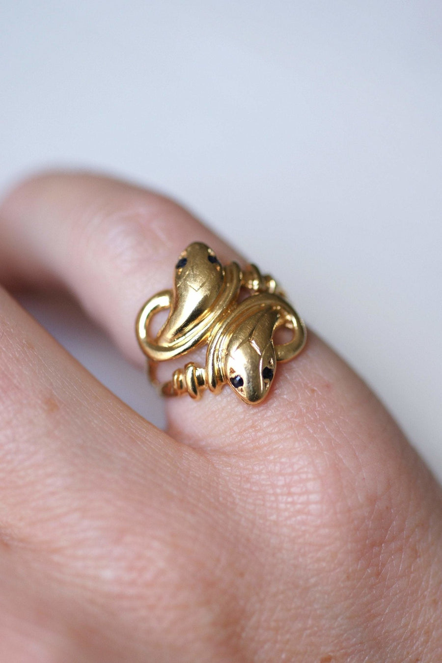 Gold and sapphire coiled snakes ring - Penelope Gallery