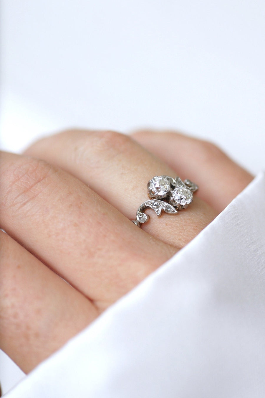 You and Me ring in rose gold, platinum, and diamonds - Penelope Gallery