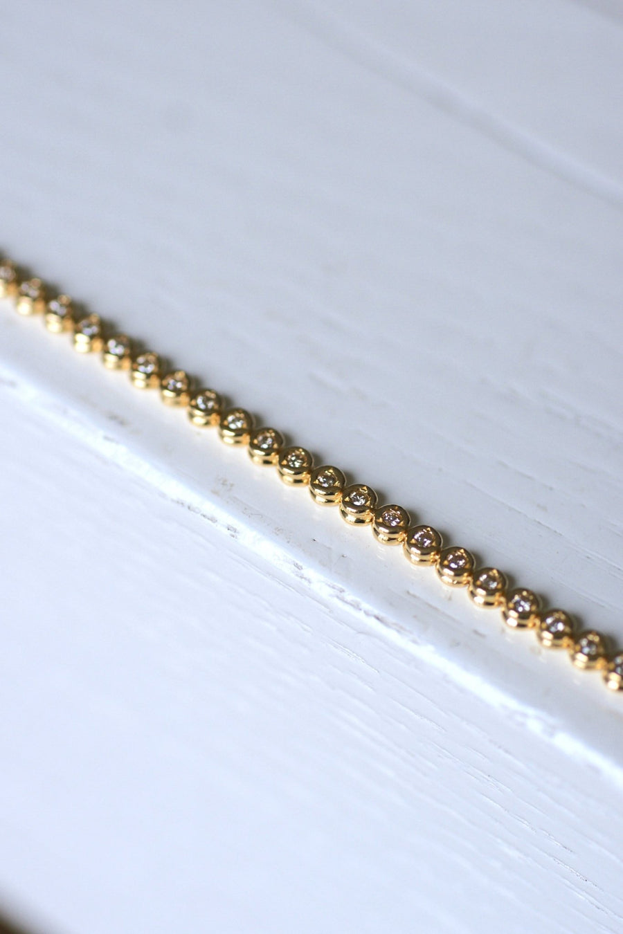 Vintage line bracelet in yellow gold and diamonds, 1.10Cts - Galerie Pénélope