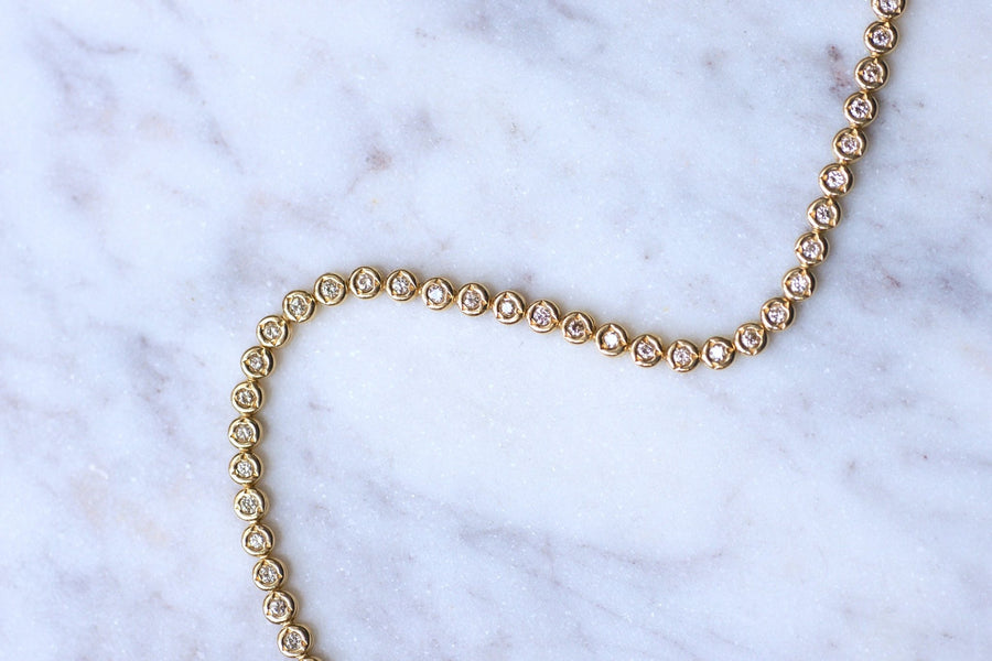 Vintage line bracelet in yellow gold and diamonds, 1.10Cts - Galerie Pénélope