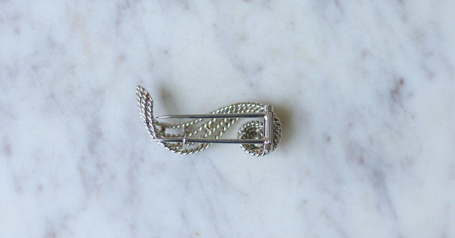 Scroll brooch with diamonds and rubies - Galerie Pénélope