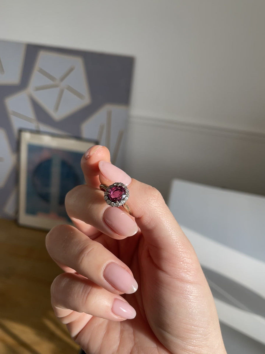 Pink sapphire and diamond daisy ring