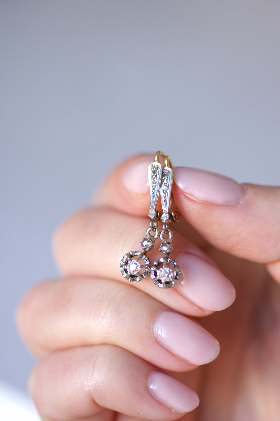 Antique gold, platinum, and diamond dangling sleeper earrings