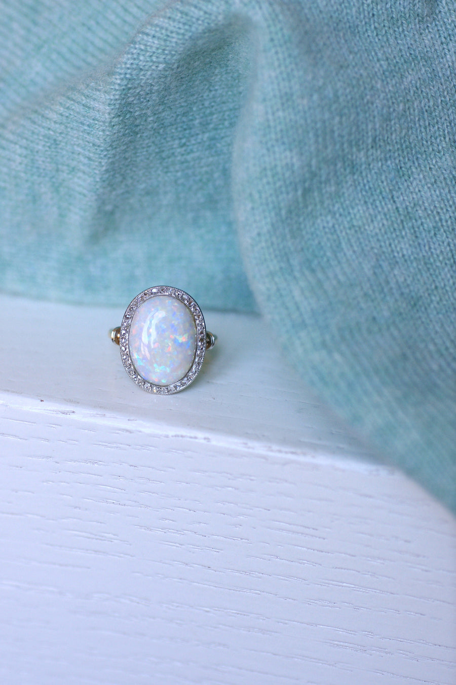 Belle Epoque Pompadour opal ring set in diamonds on gold and platinum, Circa 1900